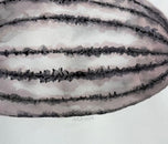 Ruth Aiko Asawa was an American modernist artist known primarily for her abstract looped-wire sculpt